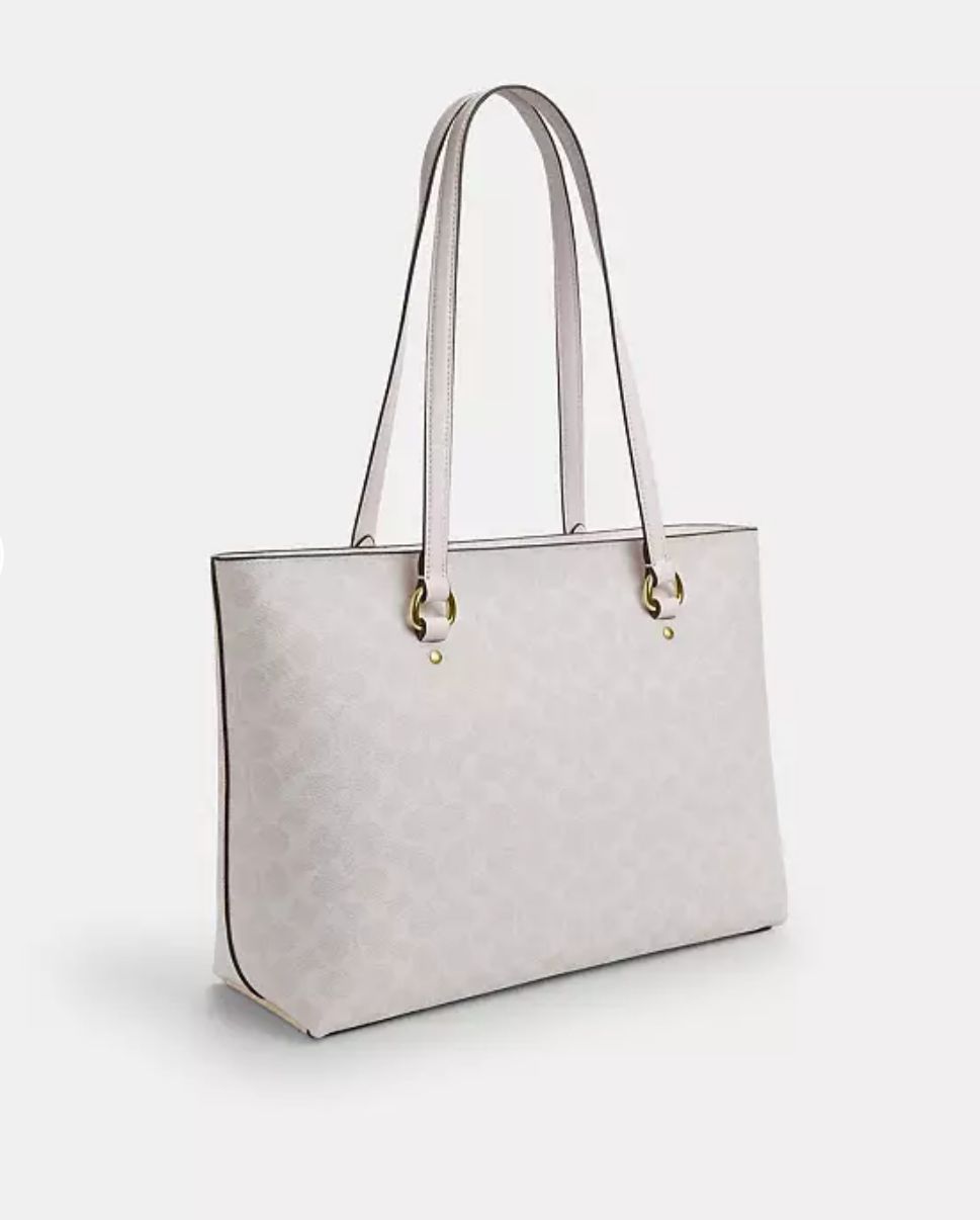 Bolso tote Station en lona distintiva.