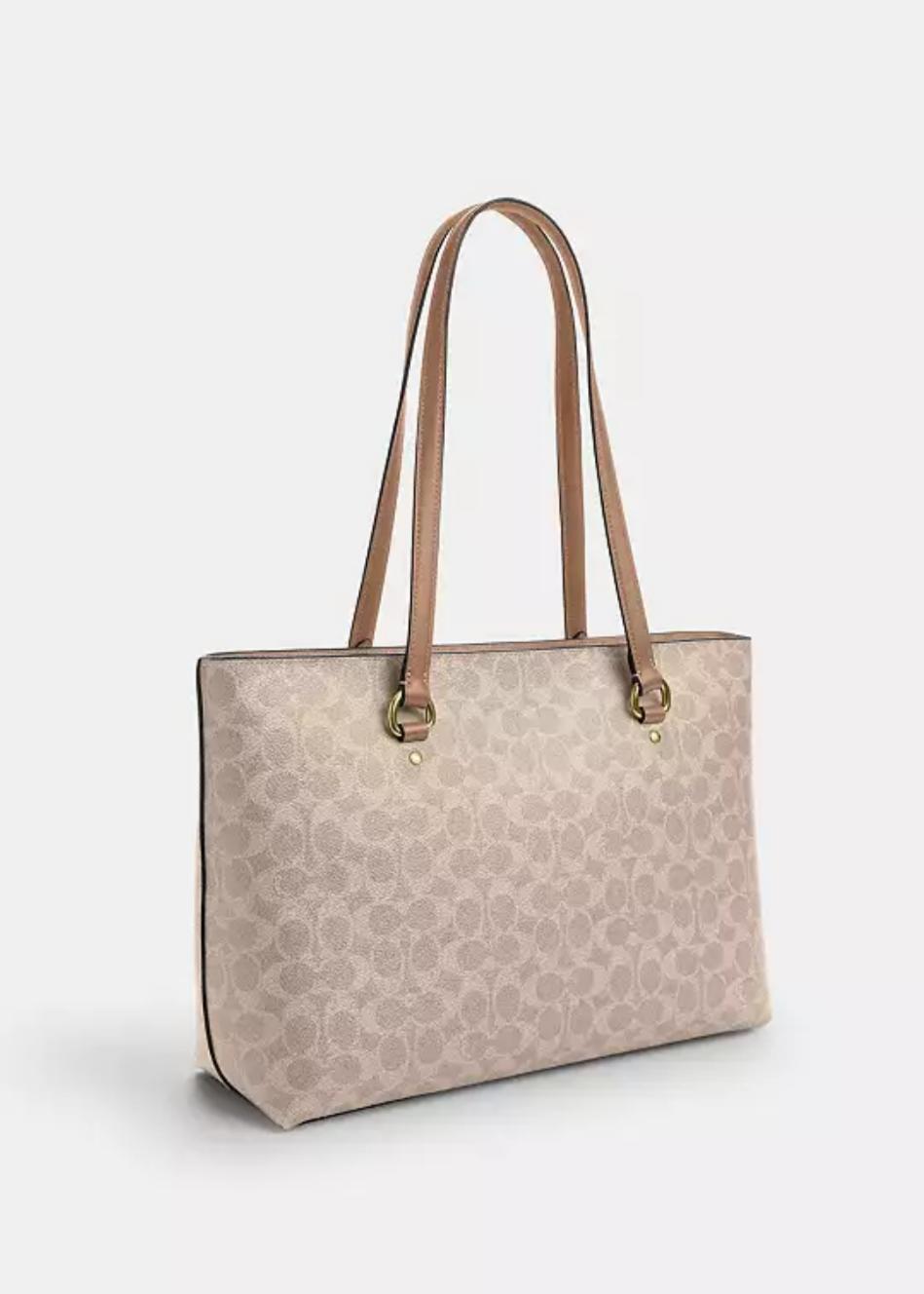 Bolso tote Station en lona distintiva.