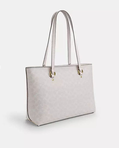Bolso tote Station en lona distintiva.